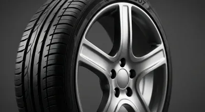 Gros plan emblématique sur une jante et un pneu de Peugeot 307 SW, symbolisant la taille et la robustesse.